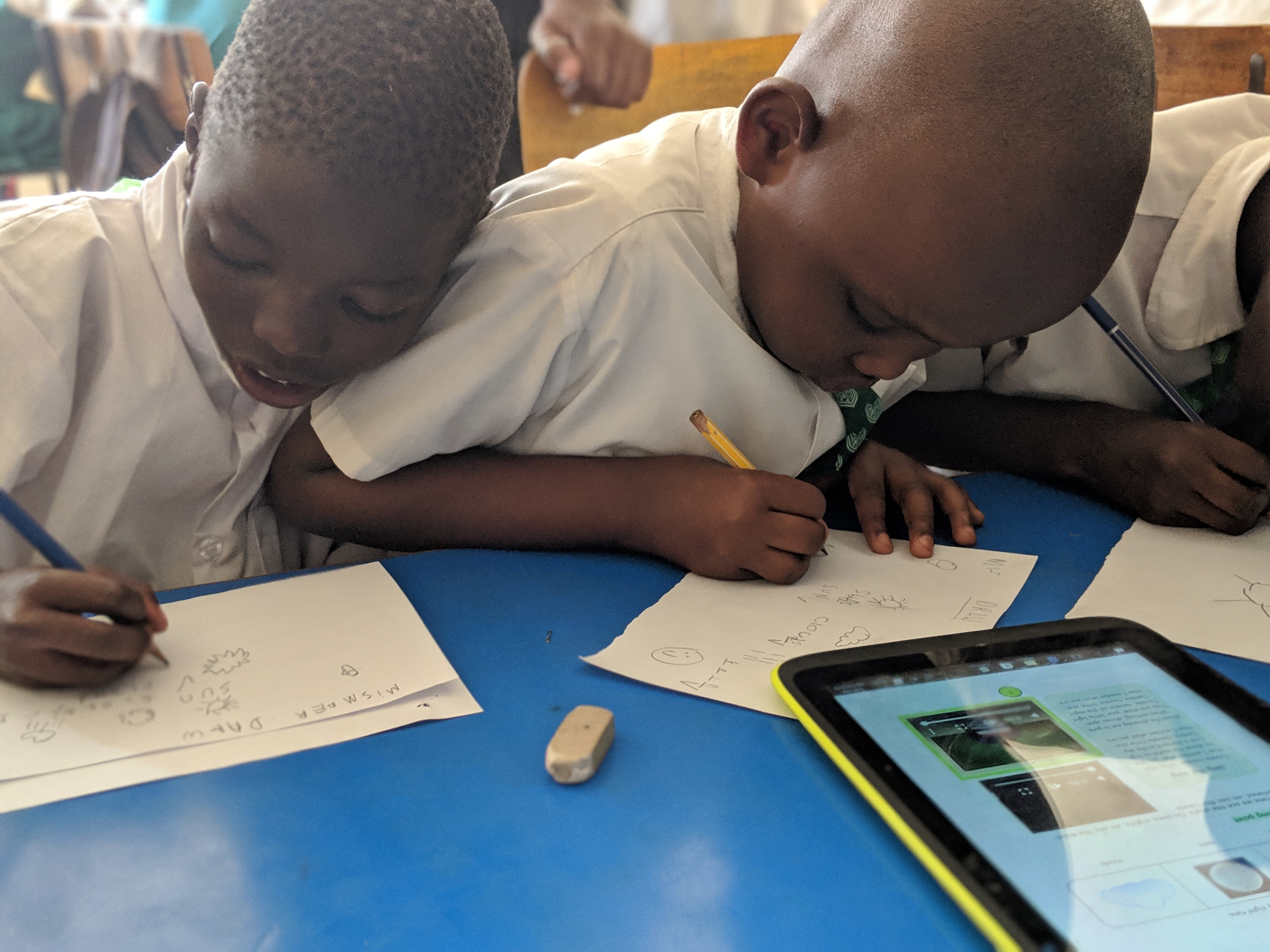 Children using the digital accessible textbook in a classroom in Kenya 