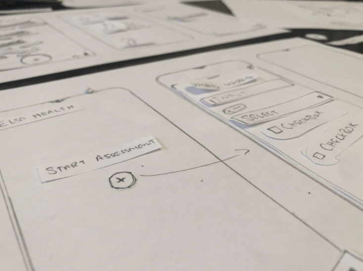 A sketch of a wireframe on white paper 