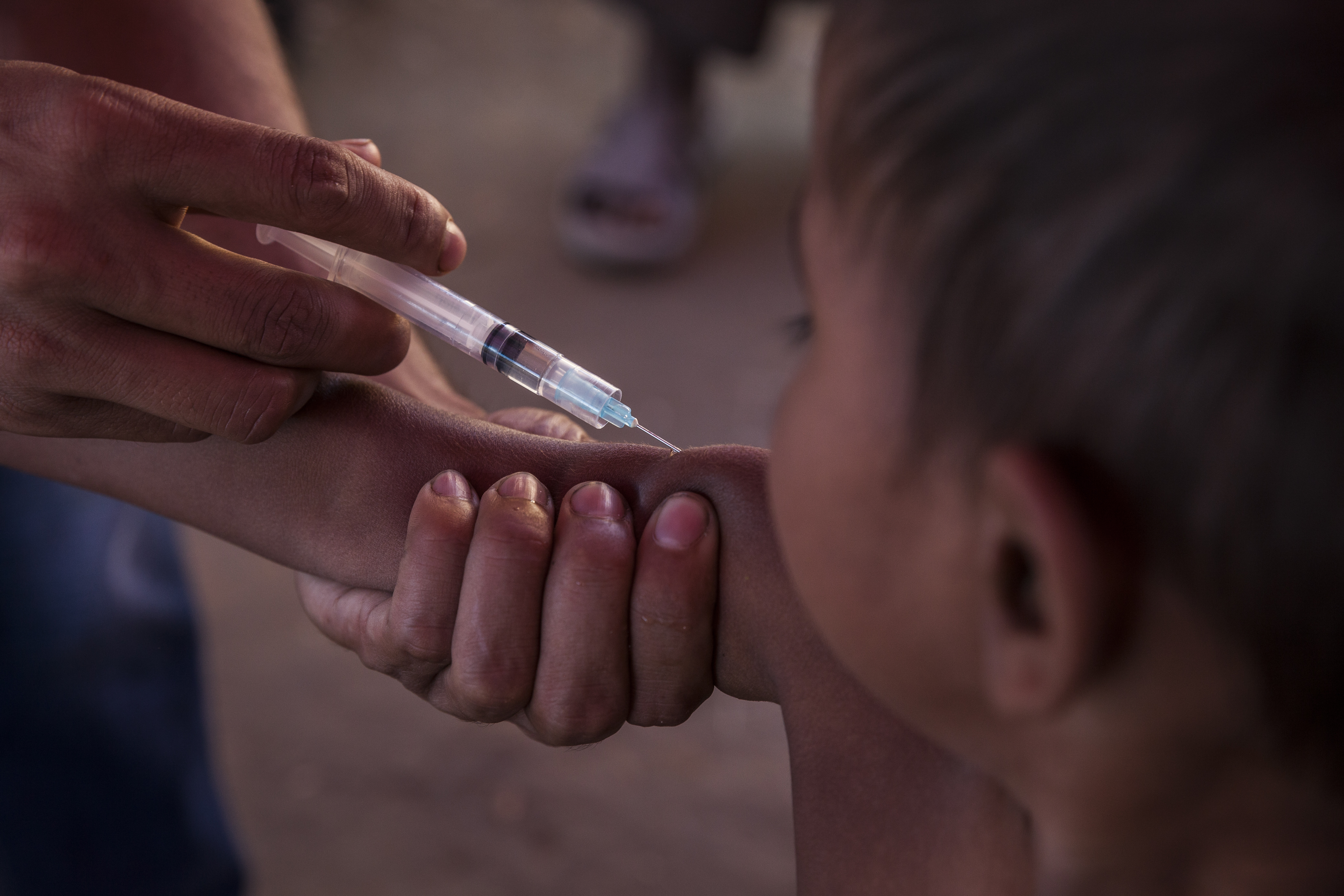 On 30 November 2017 in Bangladesh, a Rohingya child is immunized in the Unchiprang makeshift refugee camp in Cox’s Bazar district during the UNICEF-supported measles vaccination campaign.