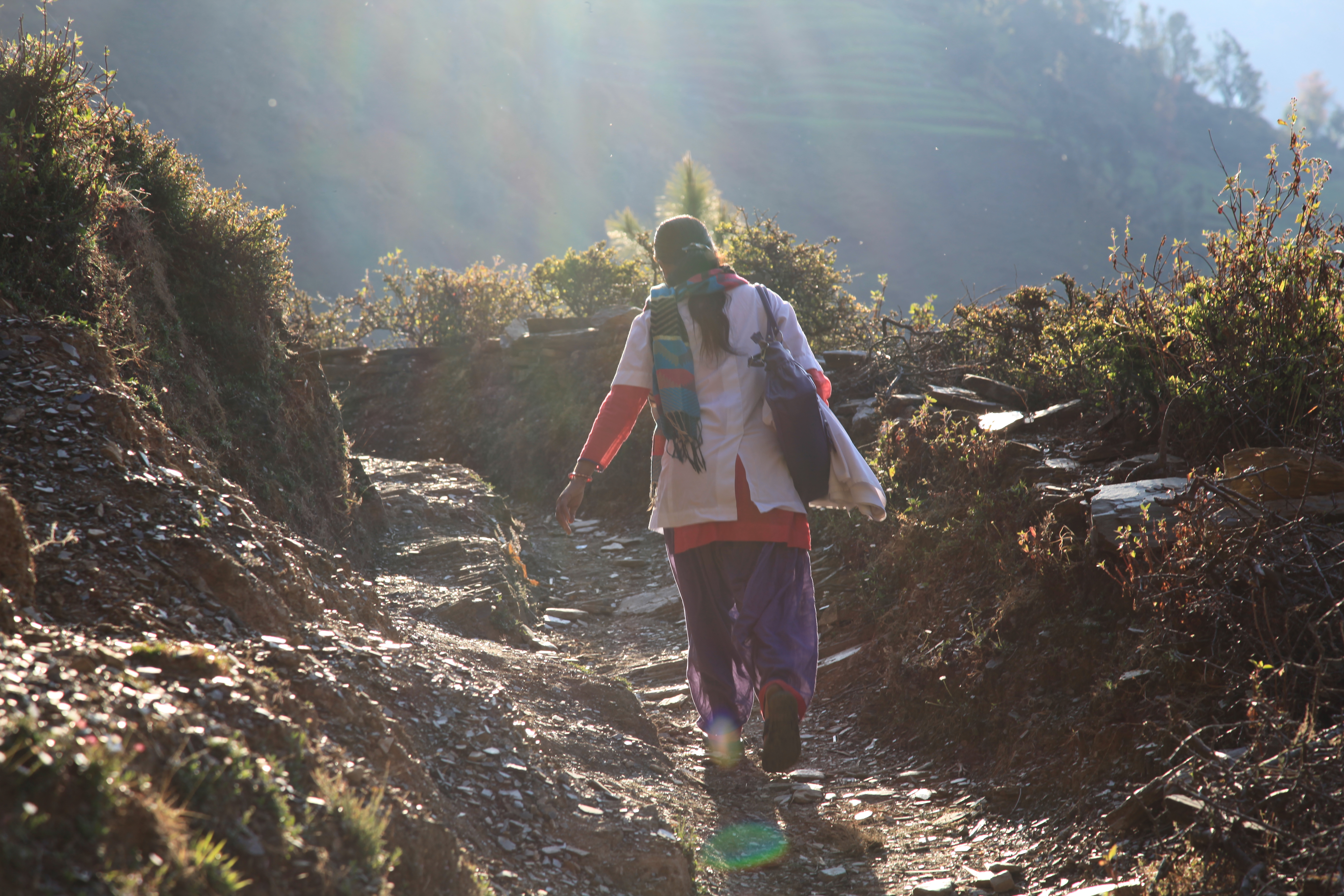 Mrs. Himalaya Awasthi, around 30 years old is a Nurse Midwife ANM. She walks two hours to visit a newborn within the first month of life in a remote rural area in Baitadi District in the Far-West of Nepal. 