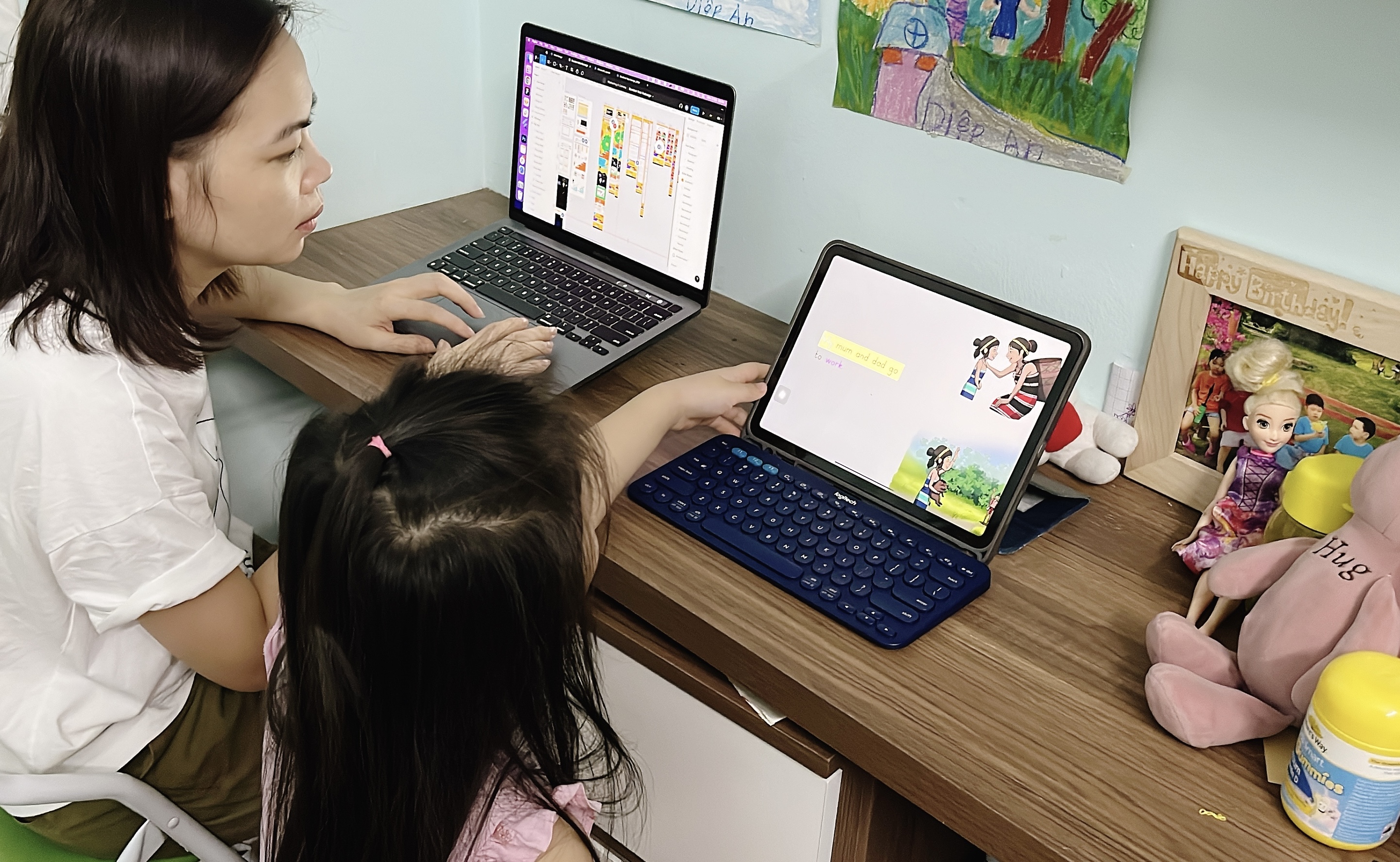 Photo of teacher and student using Bookbot