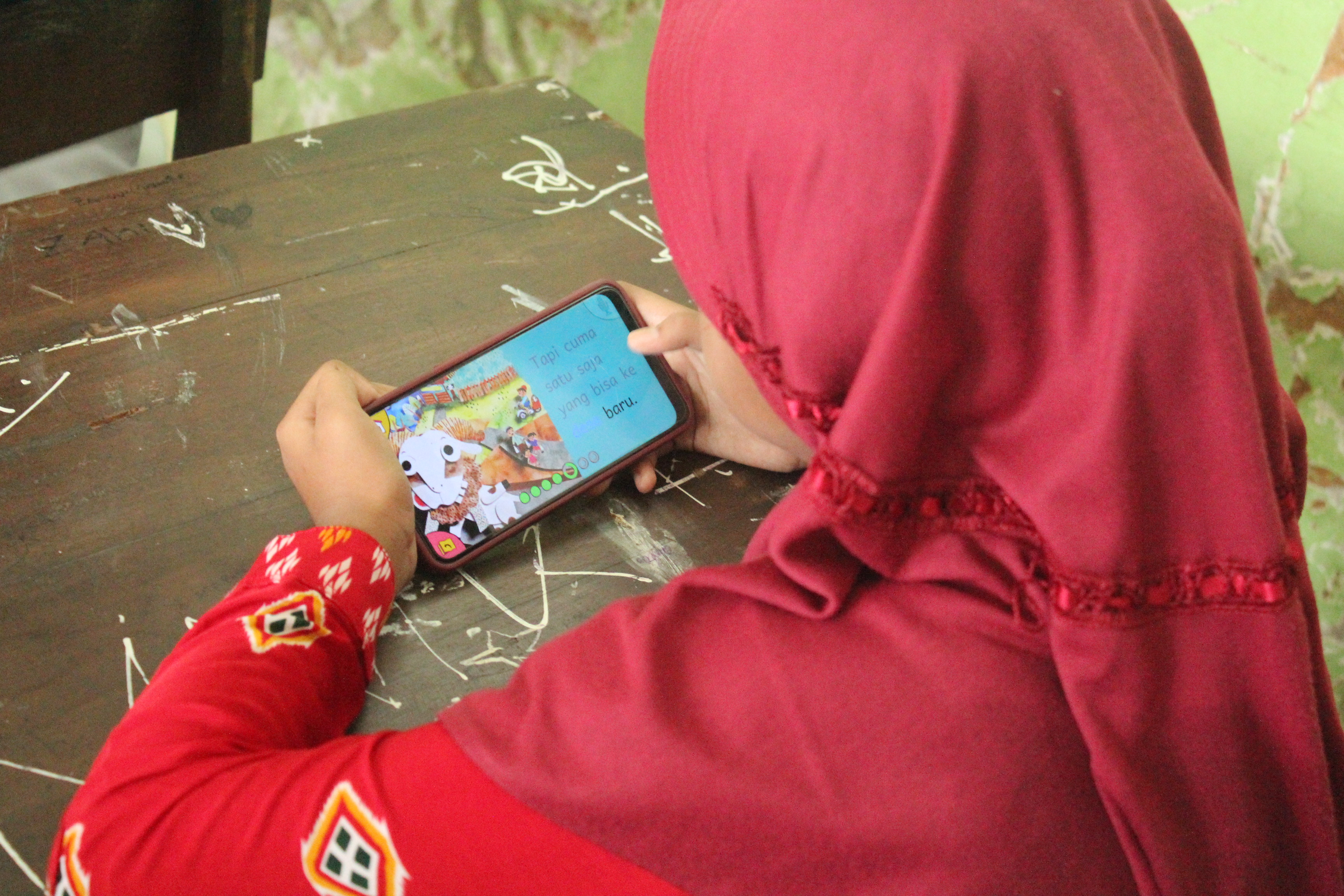 Girl in Indonesia uses Bookbot app