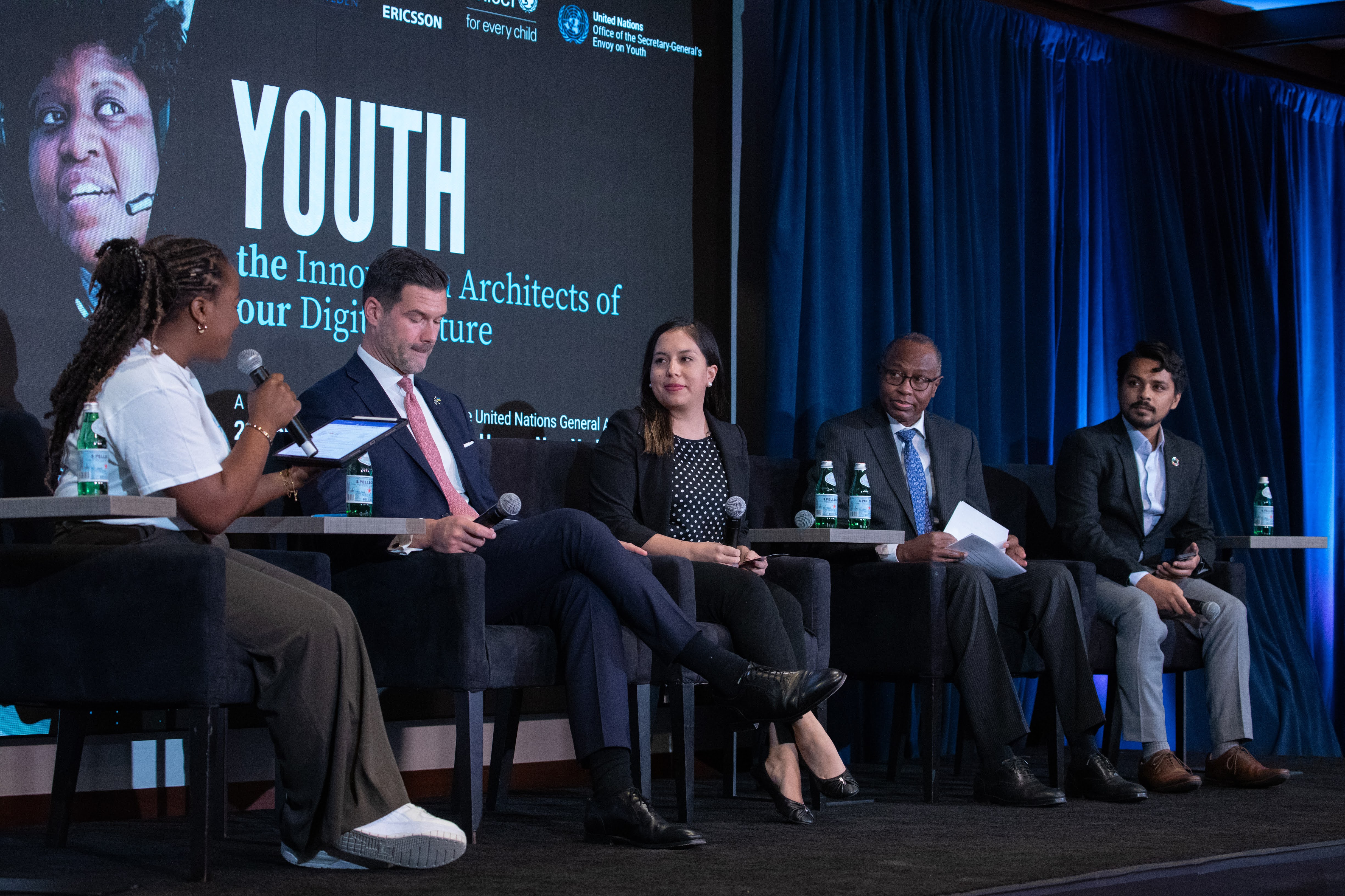 AQAI on stage at Office of Innovation-sponsored event during UNGA 2023.