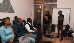 Kotani pay team at a meeting 