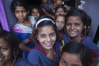 Primary School: Kasturba Gandhi Balika Vidyalaya (KGBV) Tharthari, Block- Tharthari, District: Nalanda Bihar, India, 17 May 2013 Girls with hearing disability react outside their classroom 